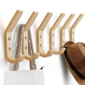 Watbeyoz decorative wall hooks add rustic charm while holding umbrellas and bags.