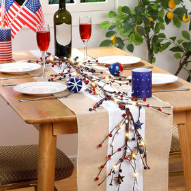 Wavwavw patriotic garland LED lights add warm celebratory glow.