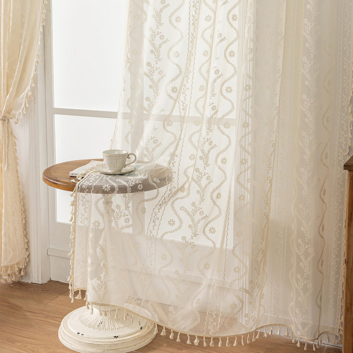 WAZZIO vintage beige lace with tassel detail adds elegant flair