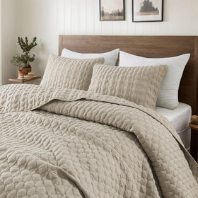 WDCOZY beige quilt queen closeup stitching adds cozy, modern texture to the bed