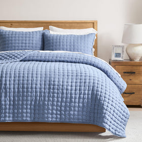 WDCOZY blue king quilt set on bed for all-season comfort.