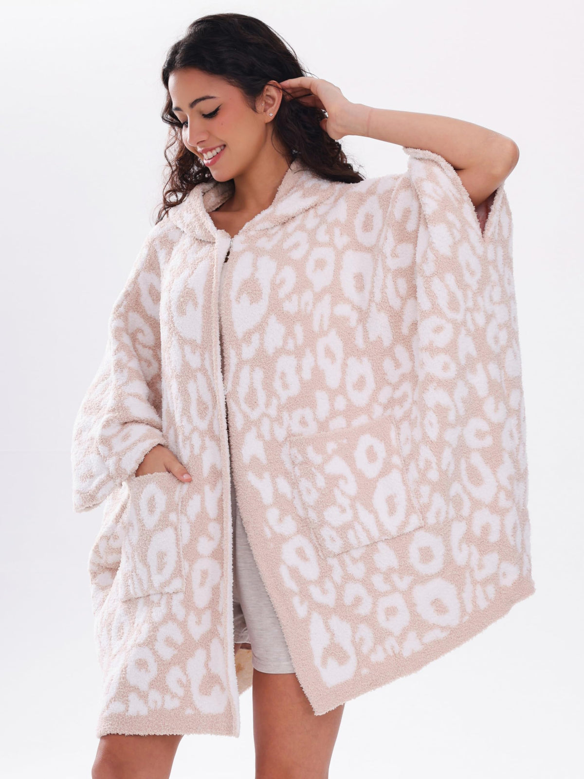 WDCOZY leopard wearable blanket hoodie with front pockets keeps hands warm and essentials close.