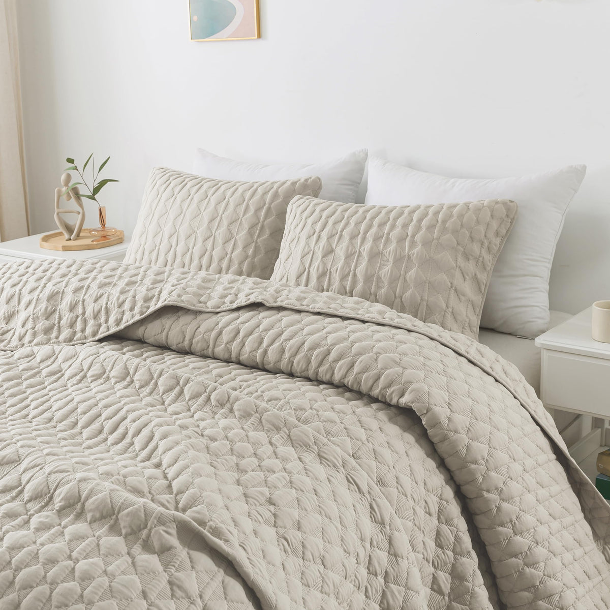 WDCOZY light beige oversized Cal King quilt draped elegantly on a bed for effortless styling