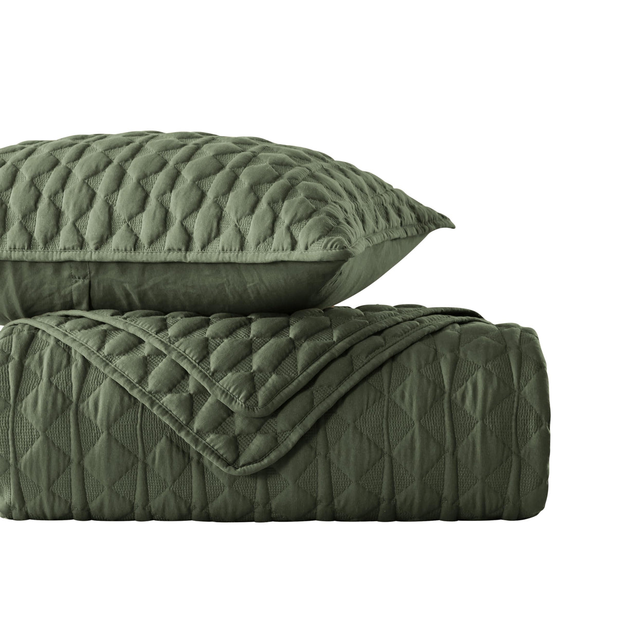 WDCOZY olive green quilt in a cozy bedroom setup