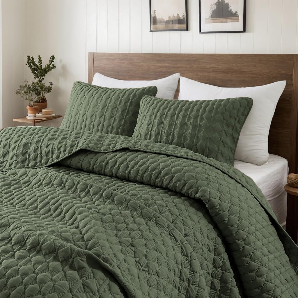 WDCOZY olive green quilt on cal king bed for all-season comfort