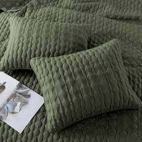 WDCOZY olive green quilt close-up shows soft microfiber texture