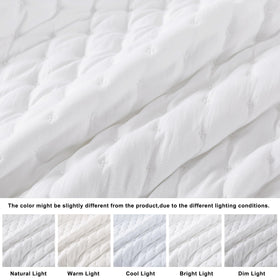 WDCOZY White Cloud Quilt close-up shows soft cross-stitch on pristine fabric.