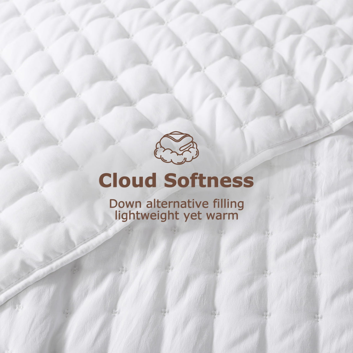 WDCOZY White Cloud Quilt on bed with shams, draping gracefully for a rustic look.