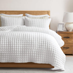 WDCOZY white twin quilt with gold cross-stitching elevates bed style