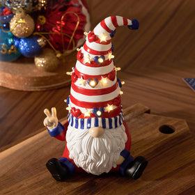 WDS WONDROUS Independence Day table decor featuring a red-blue resin gnome with warm light.