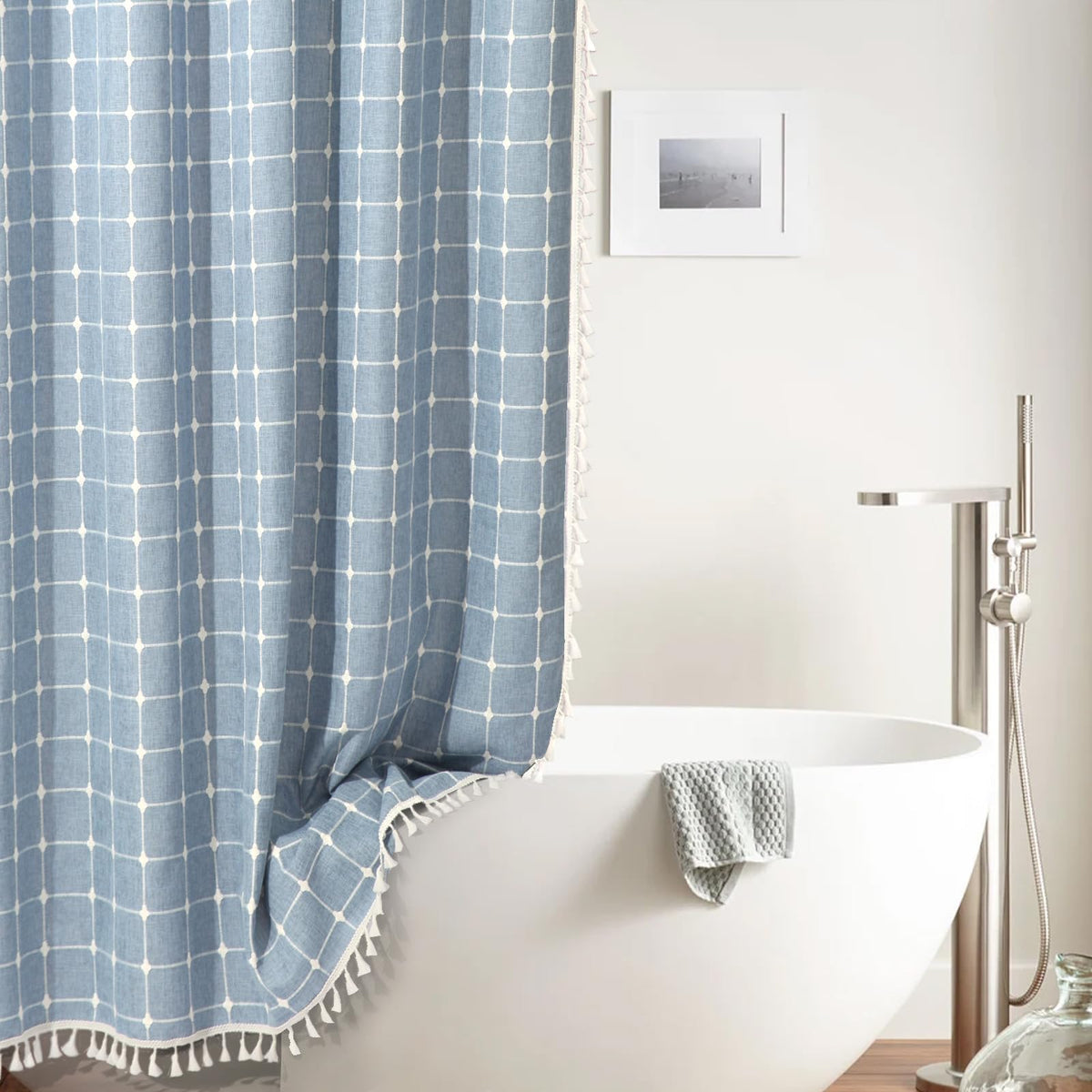 WEGOMA boho curtain blue tassels enhance texture and style in any shower.
