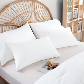 Weigelia white bedroom setup displays versatile, modern bedding.