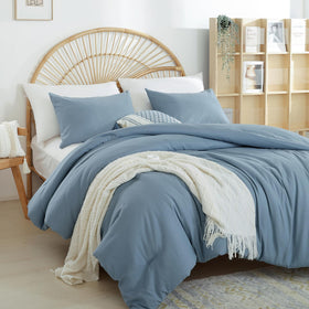Weigelia grayish-blue set on bed reveals 2-piece twin configuration with pillowcase.