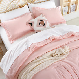 Weigelia comforter fabric close-up highlights plush microfiber texture.