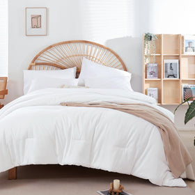 Weigelia full-size white comforter with a silky microfiber feel for all-season coziness.