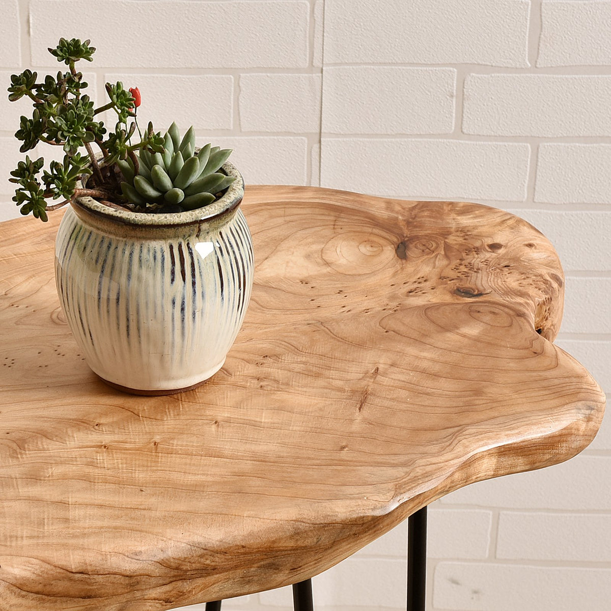 WELLAND End Table used as nightstand provides convenient bedside surface.