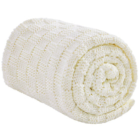 Wellfeel knitted weighted blanket draped on a bed for cozy relaxing nights.