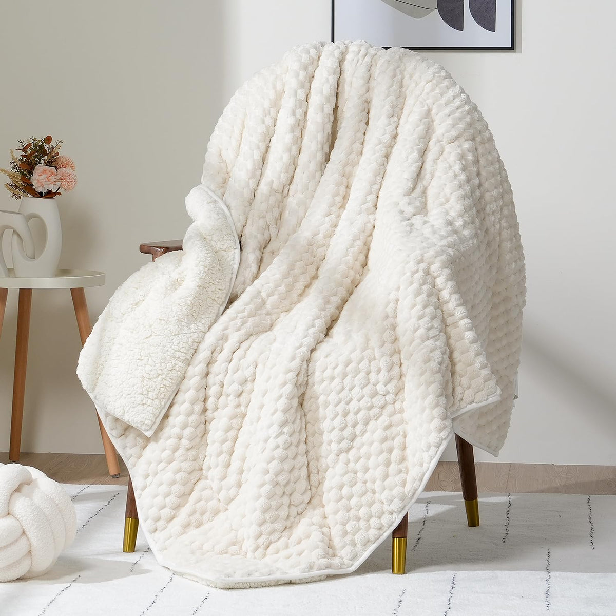 Wemore fleece weighted blanket in cream on sofa for cozy evenings