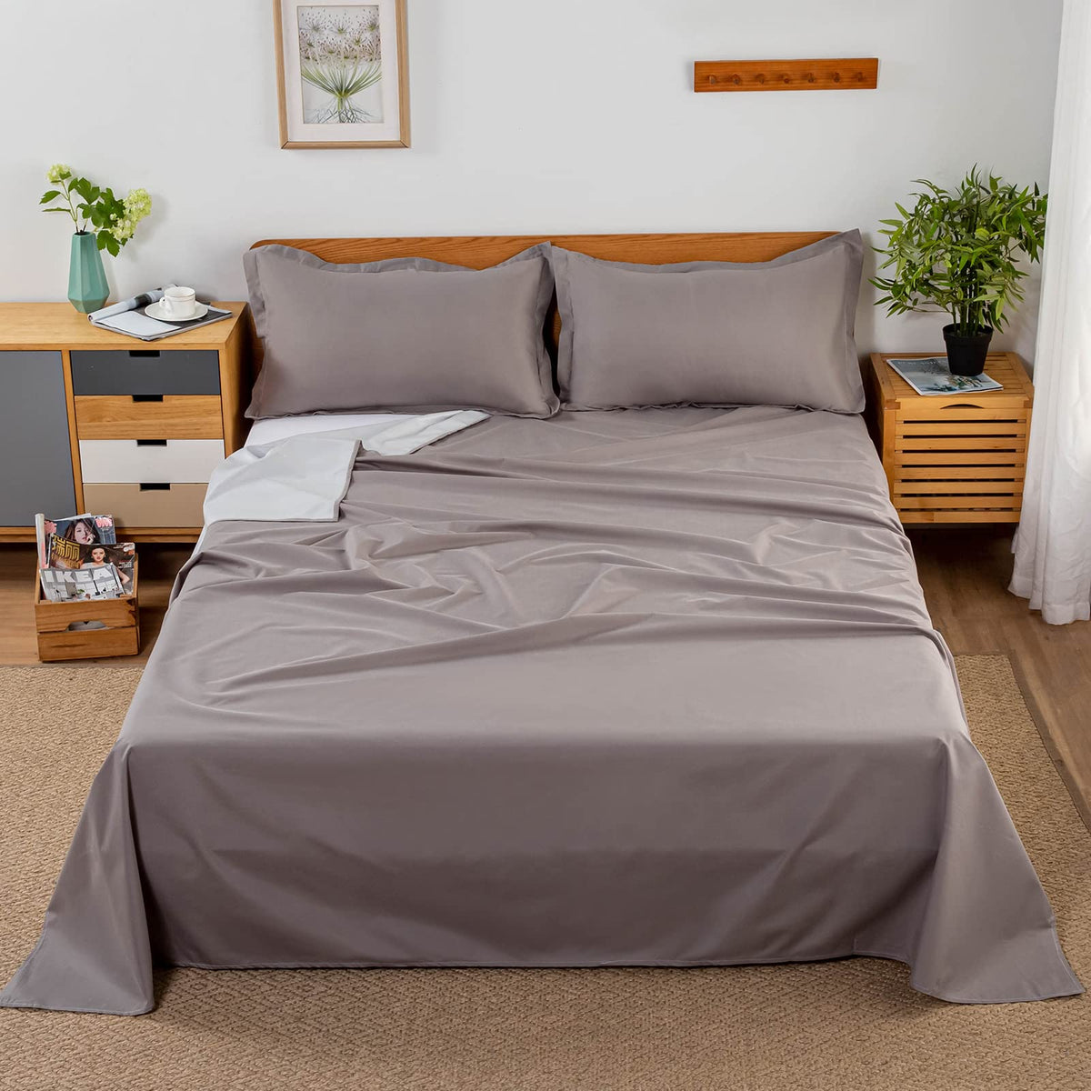 WenBags waterproof flat sheet in gray protecting a queen bed from spills