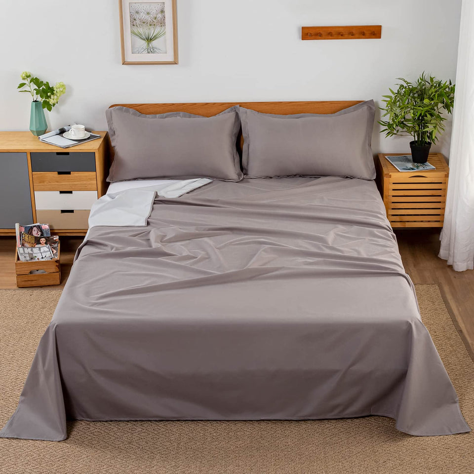 WenBags waterproof flat sheet in gray protecting a queen bed from spills
