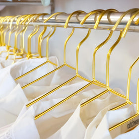 Wesiti gold metal hanger suited for boutique displays and organized closets