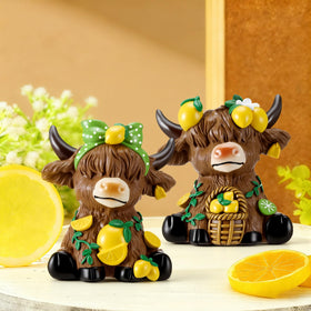 Wesiti lemon Highland cow figurine decorates shelves with a warm, natural farmhouse vibe.