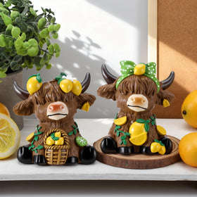 Wesiti lemon Highland cow figurine pairs well with tiered trays and mantels.