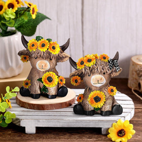 Wesiti Highland cow figurine pair demonstrates durable resin quality.