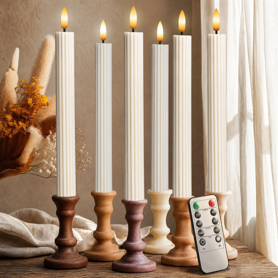West Ivory 10-inch LED flameless taper candle with remote timer for easy ambience.