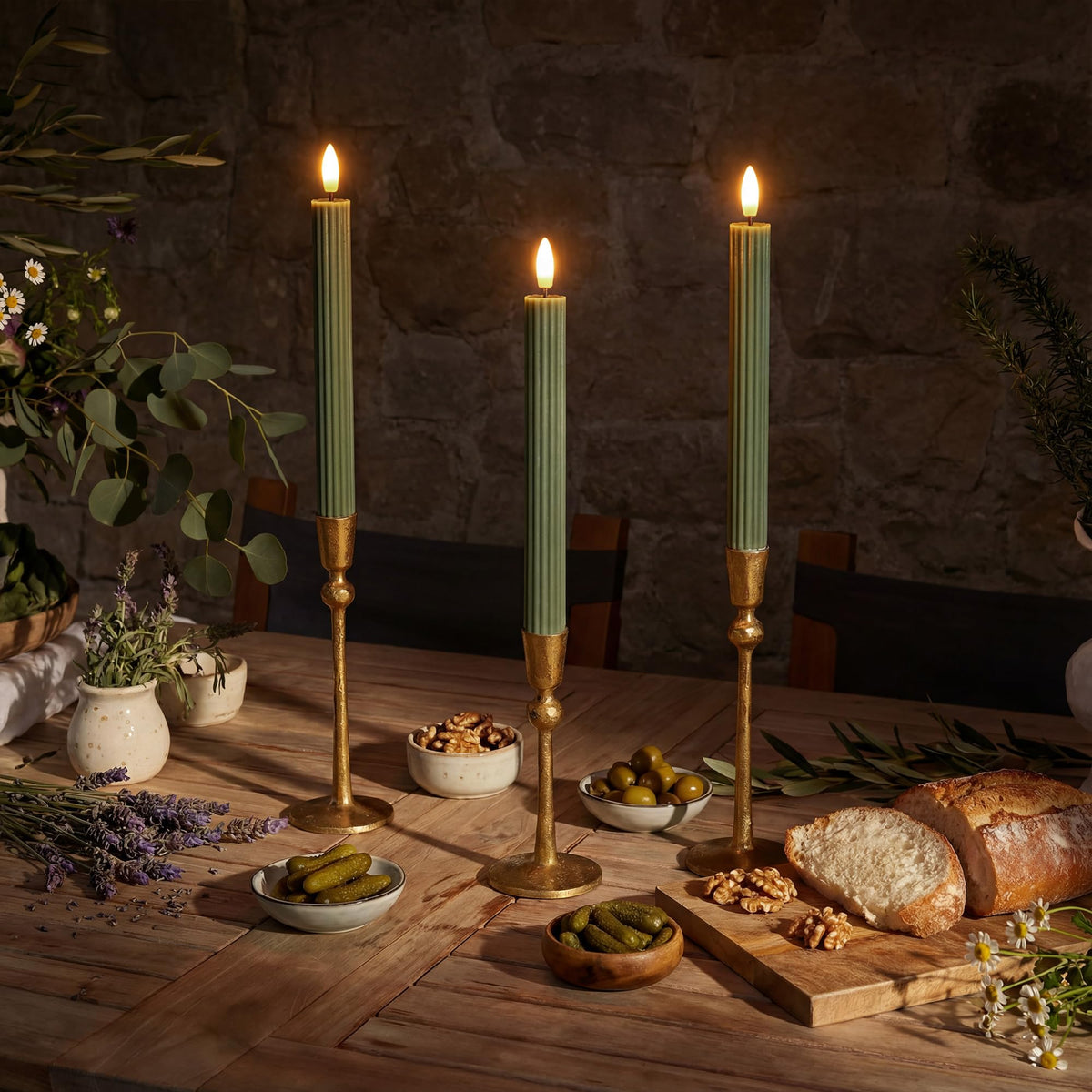 West Ivory unscented fluted candle resting on a dining table centerpiece.