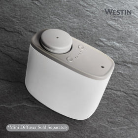 Westin refill bottle highlighting cedar and vanilla notes for a soothing atmosphere.