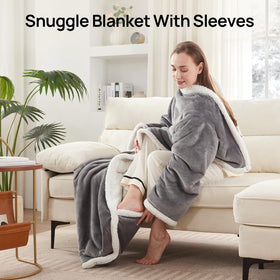 Westinghouse Snuggle Throw worn on sofa for comfortable lounging.