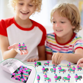 Weysat rainbow pinatas as bright party favors and gifts.