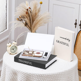 Weysat decorative books on a mantel add texture and neutral harmony