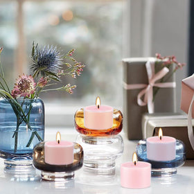 Wfmolcand rose-scented tealight boosts calm and focus during yoga.
