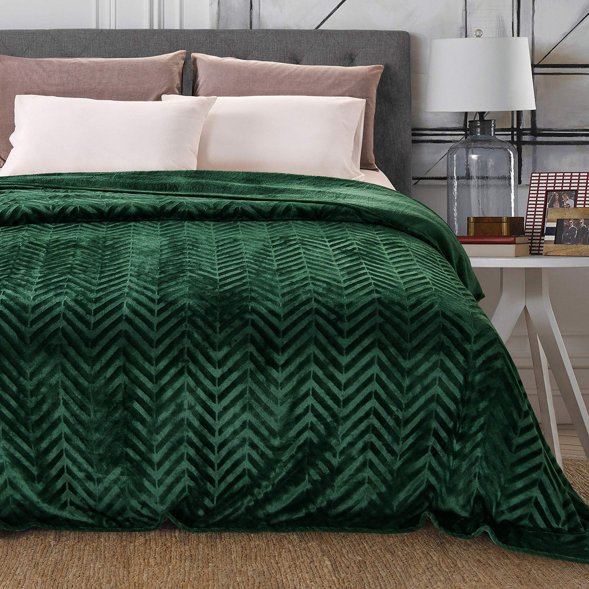 Whale Flotilla emerald green throw brightens room with plush softness.