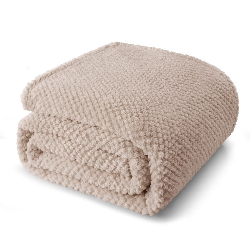 Whale Flotilla king-size blanket draped on bed for all-season warmth
