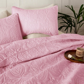 Whale Flotilla pillow sham in pink completes the set's coordinated aesthetic.