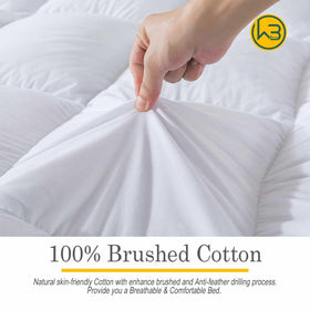 WhatsBedding duck feather memory foam topper close-up showing plush, supportive fill