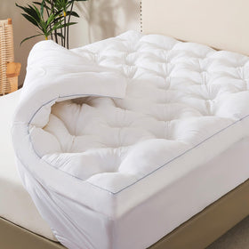 WhatsBedding fluffy shredded memory foam topper with airy fill for cloud-like comfort and breathability.