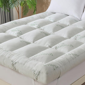 WhatsBedding memory foam topper provides cushioned support for a comfortable night