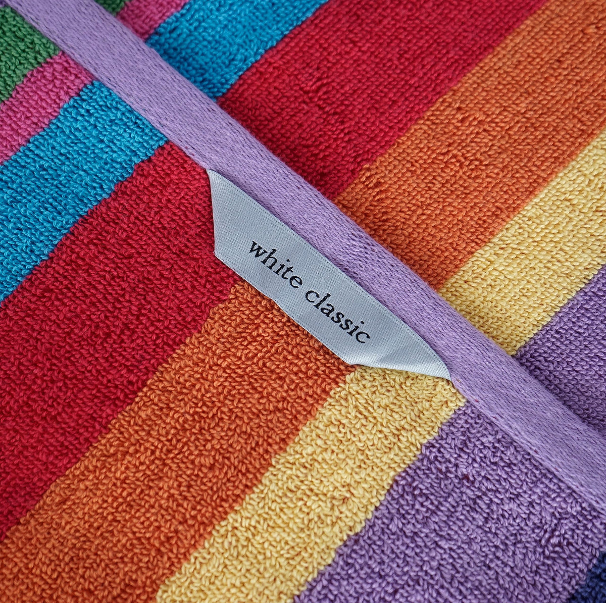 White Classic 60-by-30-inch towel offering generous beach coverage.
