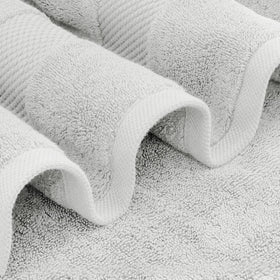 White Classic towel demonstration of high absorbency and quick-dry potential.
