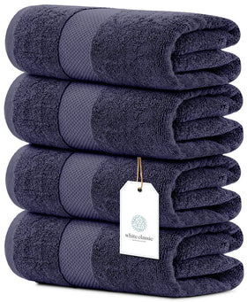 White Classic navy towels neatly folded for spa-like bathroom