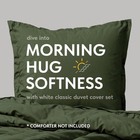 White Classic duvet cover on a styled bed with rich green color for modern bedroom vibes