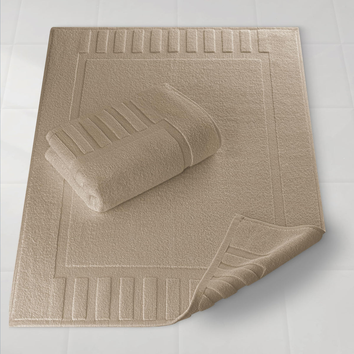 White Classic luxury bath mat 22x34 taupe over tub edge demonstrates generous size