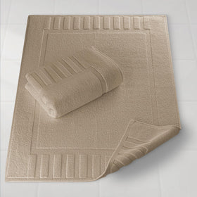 White Classic luxury bath mat 22x34 taupe over tub edge demonstrates generous size