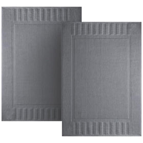 White Classic Luxury Bath Mat with absorbent cotton for fast drying on bathroom floors.