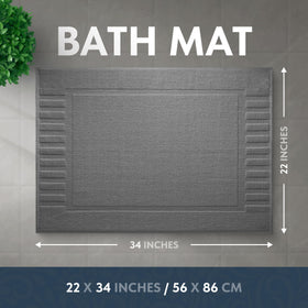 White Classic Luxury Bath Mat with non-slip backing stays in place by tub or sink.