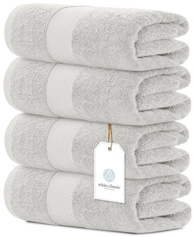 White Classic luxury bath towels set folded to show plush softness and generous 27x54 size.
